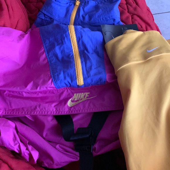 I am selling a Nike outfit it is pink and yellow
